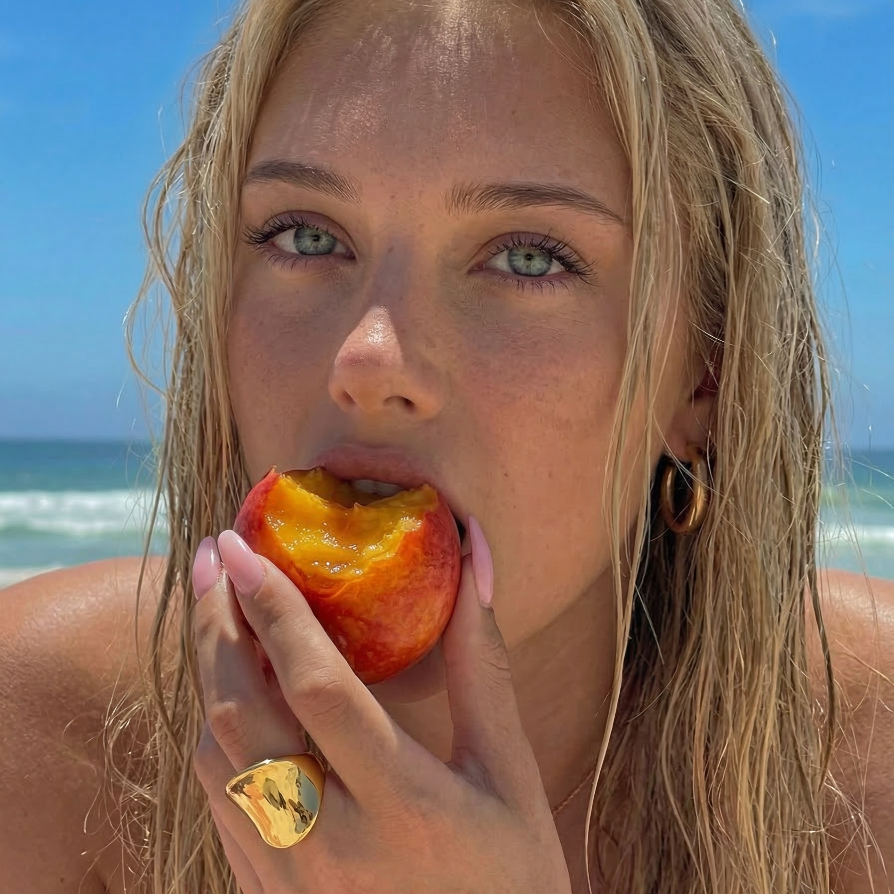 blonde girl wearing summer jewellery