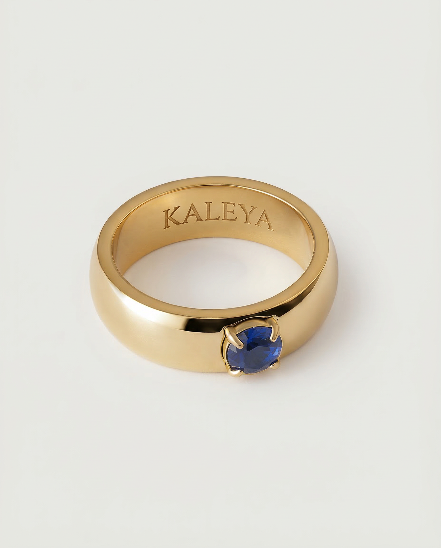 Myla Ring - gold dome ring with blue cubic zirconia