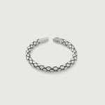 A sterling silver ring with an intricate scale-like pattern, featuring an open-ended design for adjustable sizing.