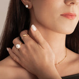model wearing 18k gold plated ring with big natural freshwater pearl