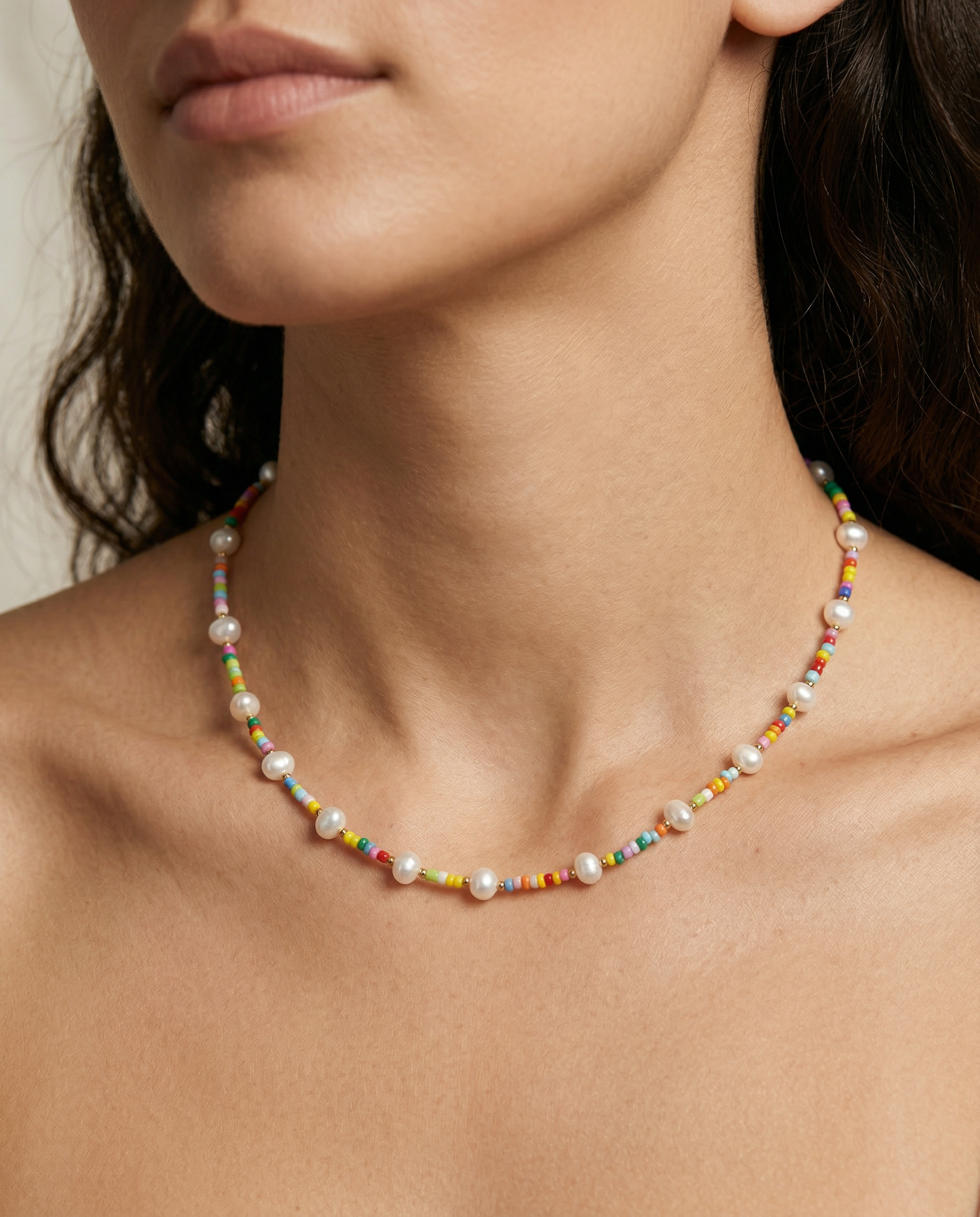 model wearing malta beaded and pearls necklace