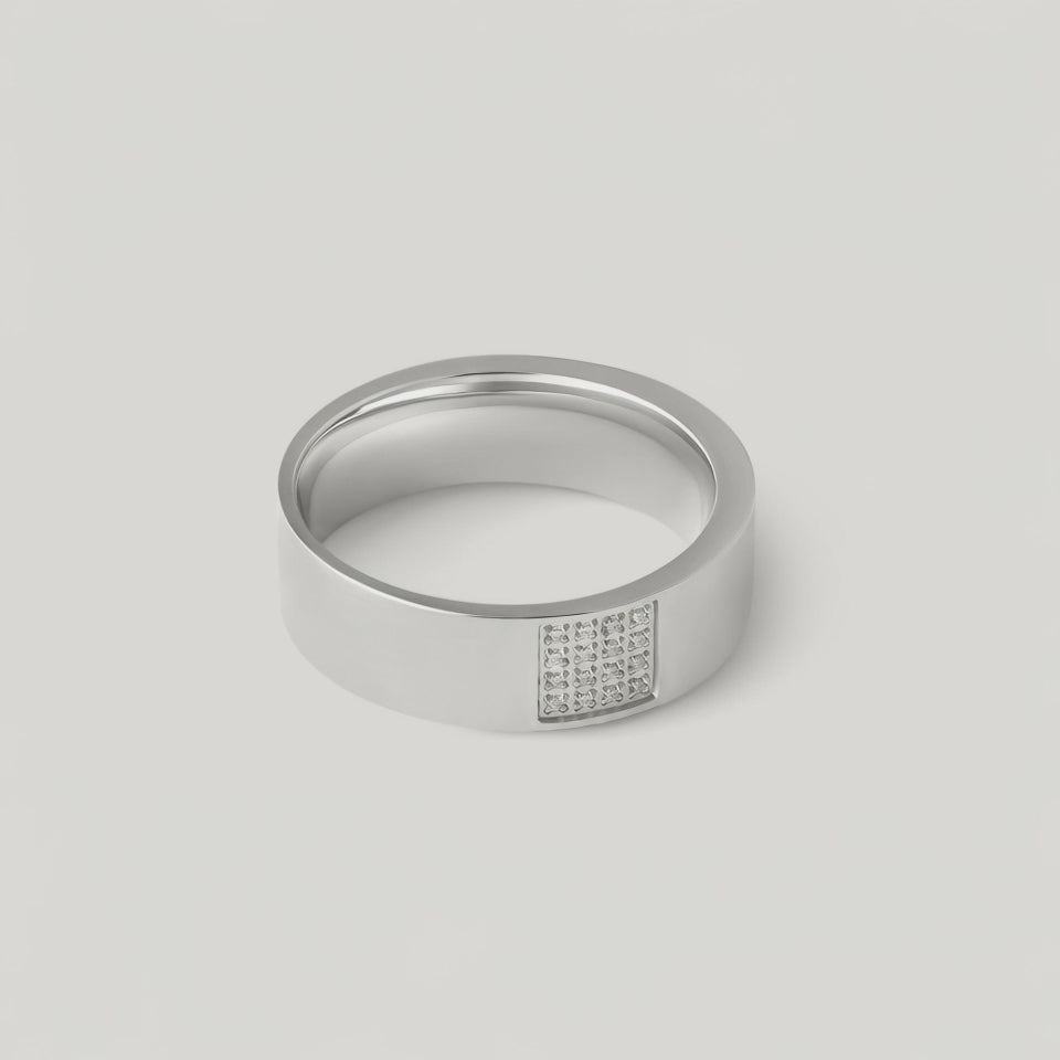 video showing a silver ring with a rectangular accent paved with sparkling cubic zirconia stones, by kaleya studio